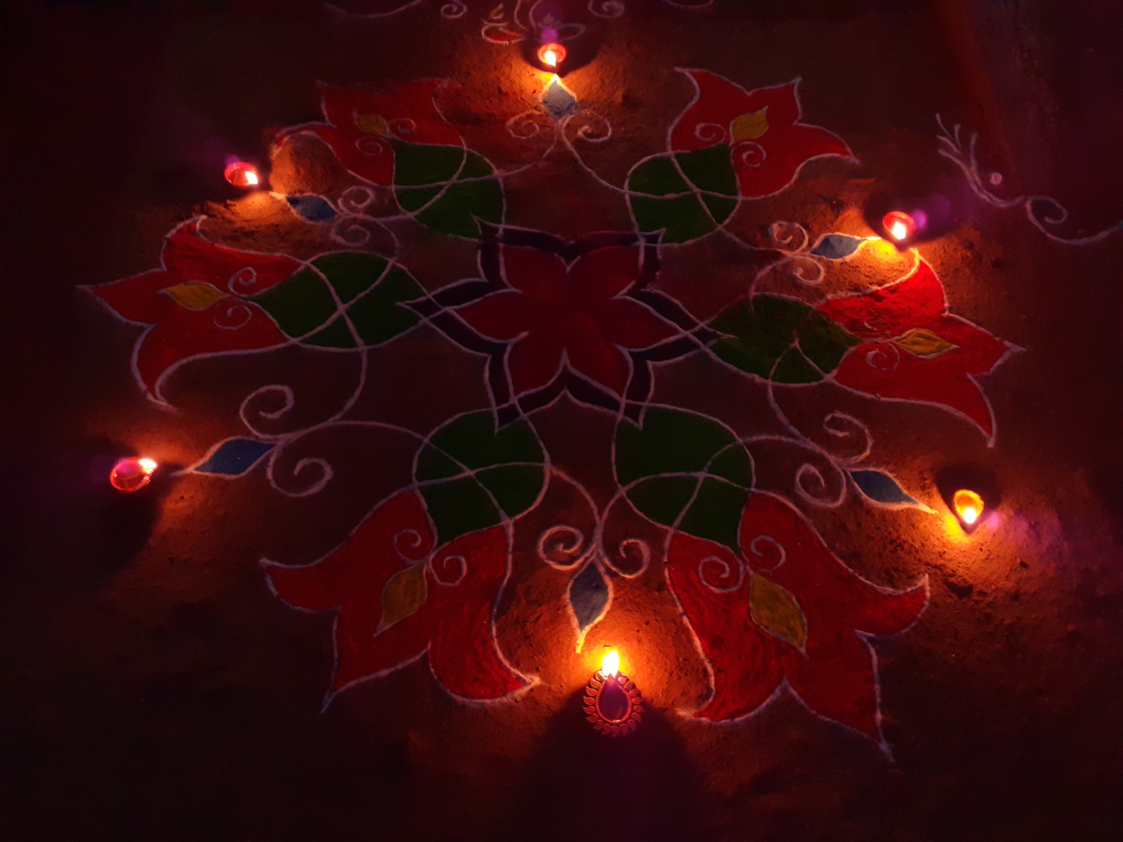 Diwali rangoli and oil lamps